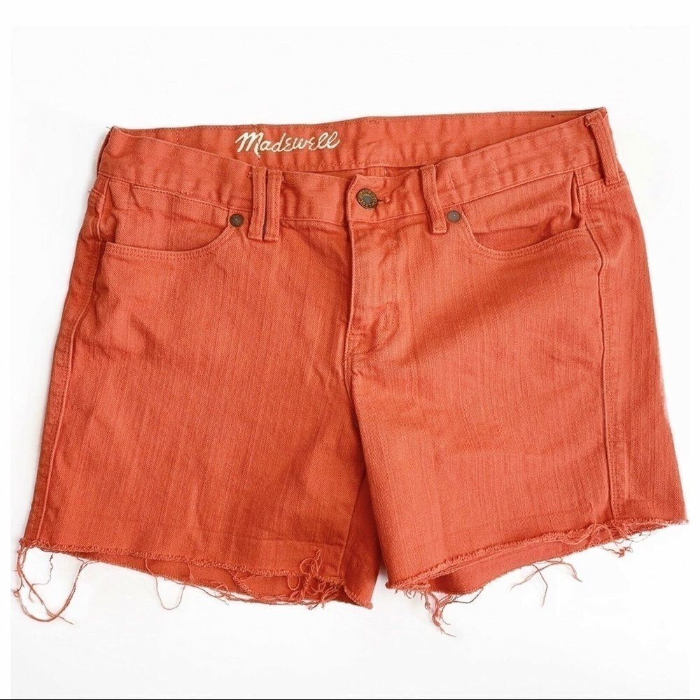 MADEWELL  Midi Cuff Denim Shorts in Coral/Orange.